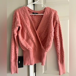 Cross front cable knit sweater